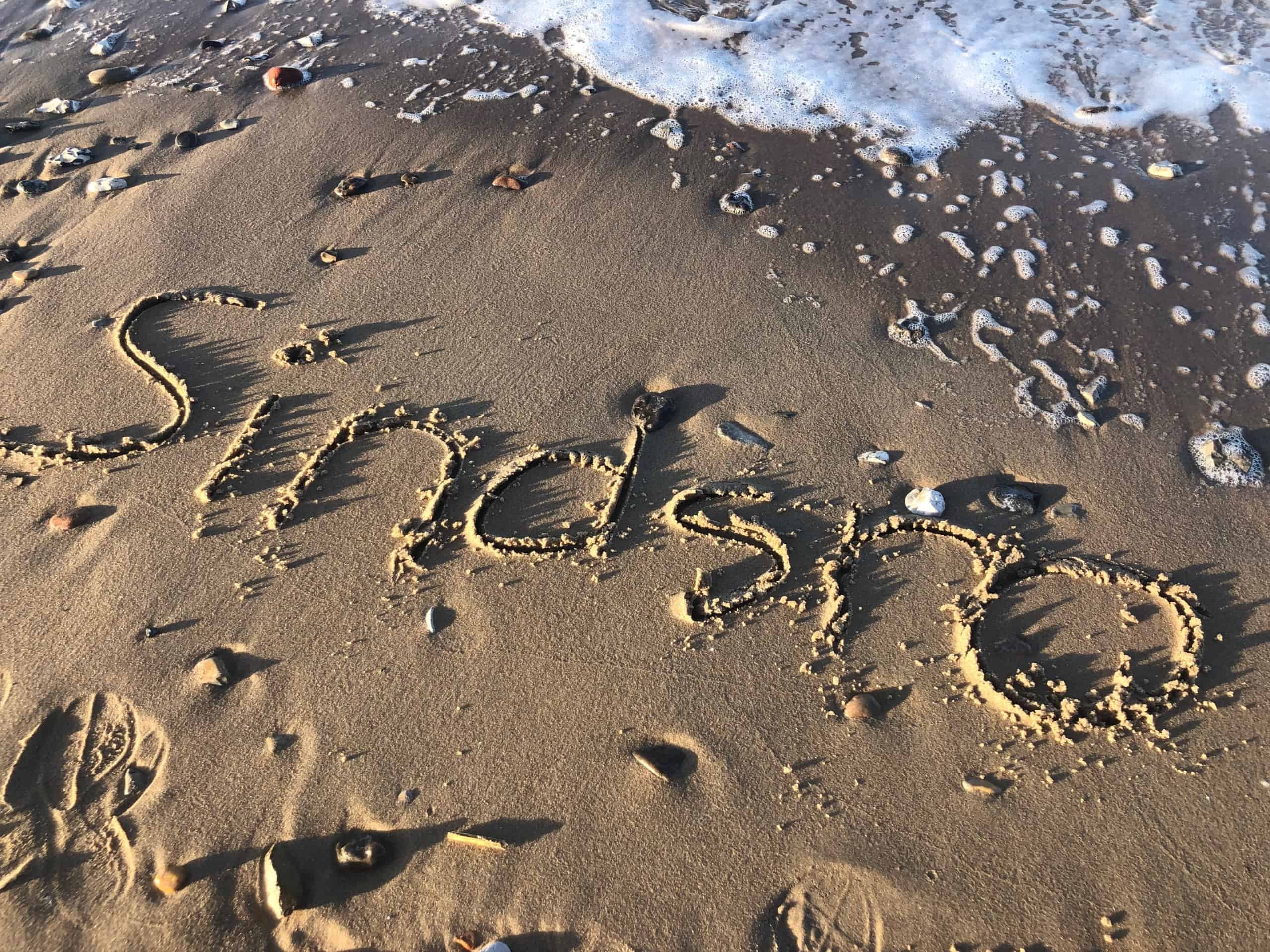 sindsro skrevet i sand